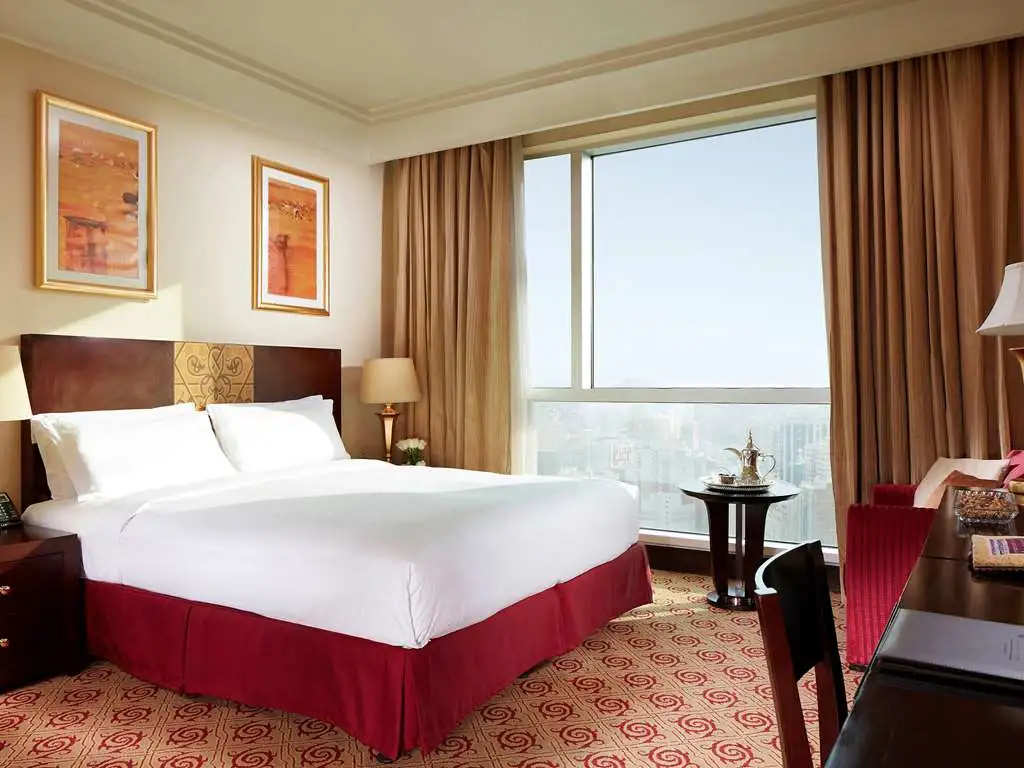 Spacious deluxe room at Pullman Zamzam Makkah with Haram view, perfect for Umrah travelers.